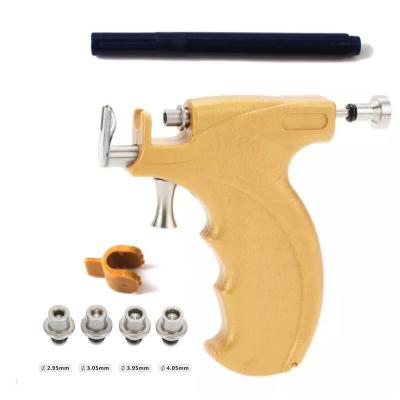 China Professional Punk Ear Gun Nose Navel Body Earring Piercing Gun and Accessories Yellow Gun Piercing Tool Kit for sale