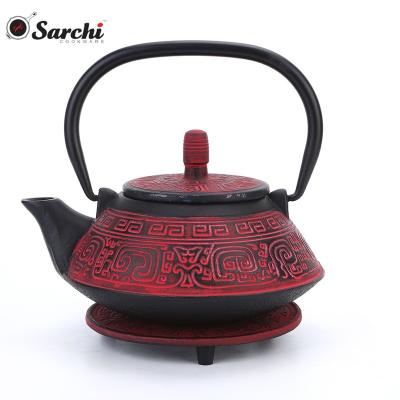 China Sustainable cast iron teapot with enameled base and filter coating for sale