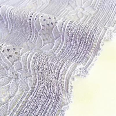 China 2022 new viable knitted warp lace crepe flowers cut out ply fabric 98% polyester 2% spandex hollow fashion women wear for sale