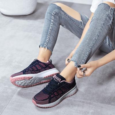 China Lightweight Four Season Casual Lightweight Fly Weaving Lace Up Women Running Shoes for sale