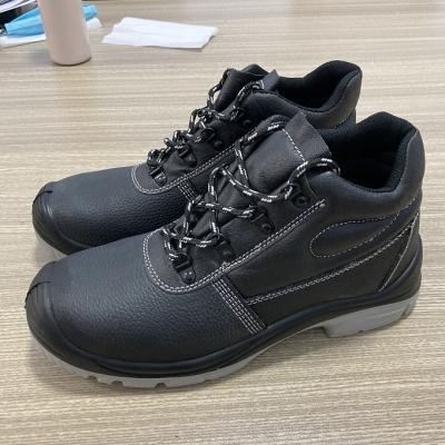 China Injection Iron Toe Leather PU/PU Safety Shoes for sale