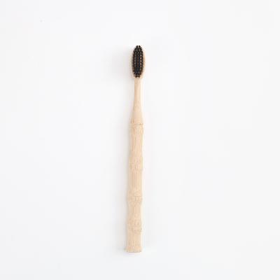 China Disposable Customization Unique Design Bamboo Shaped Natural Organic Black Soft Bristle Charcoal Bamboo Toothbrush for sale