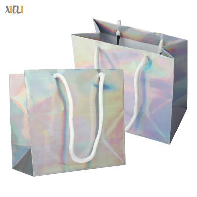 China Decoration Xieli Laser Color Silver Party Gift Bags Happy New Year Eve Party Paper Bag for sale