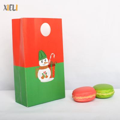 China Eco-Friendly Recycle Custom Christmas Treat Bags Paper Candy Bags Snowman Candy Canes Gift Bags Gift For Christmas Holidays for sale