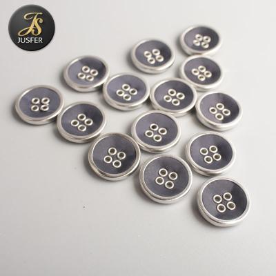 China Flat Dry Cleaning Button Four Holes Buttons Fabric Button With Silver Ring For Coat for sale