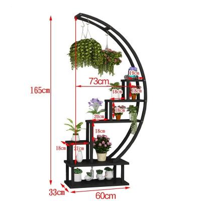 China Multi-storey indoor type flower pot shelf storage meat corrosion protection circular heart-shaped living room balcony iron floor rack for sale