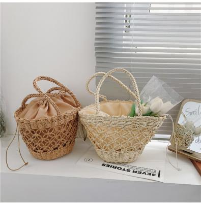 China Fashion Statistical Large Capacity Straw Woven Basket Retro Woven Basket Vegetable Bag Vacation Style Beach Portable Bag for sale