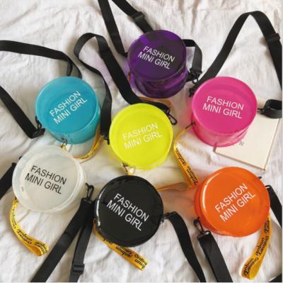 China Fashion hot sale high quality round shape PVC purse around new letters on the handbag girls cute PVC handbag 2019 for sale