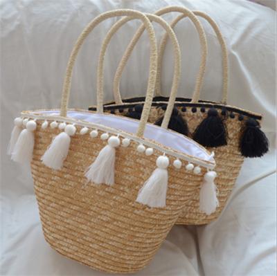 China 2020 Fashion Hot Selling Summer Straw Beach Bag Wholesale Tassels Straw Bag for sale