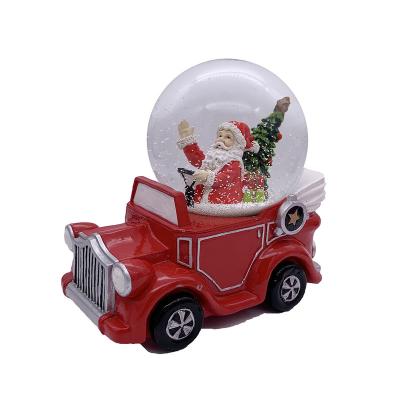 China Global New Arrival 100mm Santa Claus Snow Globe With Resin Train Base By Hand Painted For Kids for sale