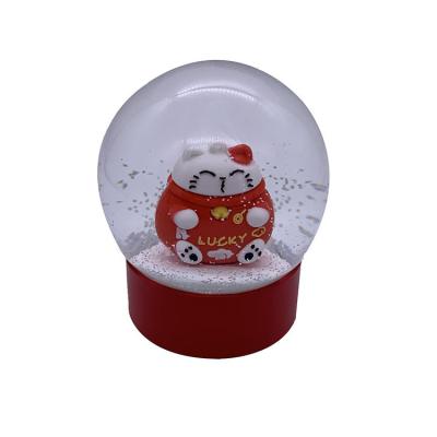 China New Design 100MM Worldwide Resin Lucky Cat Snow Globe For Home Decoration And Gifts for sale