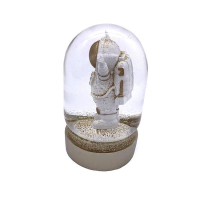 China Global H: 17CM Resin Crafts Standing Astronaut Oval Glass Dome Snow Globe for sale