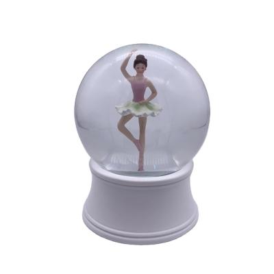 China Worldwide 120MM Resin Glass Snow Globe With Ballerina Inside For Table Birthday And Wedding Keepsake Decorative Gift for sale