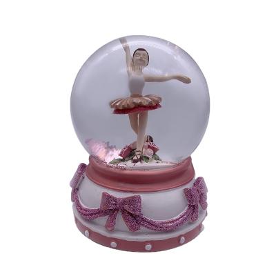 China Resin Craft 120MM Ballerina Dancing Girl World Shopping Snow Globe With Music For Girls for sale