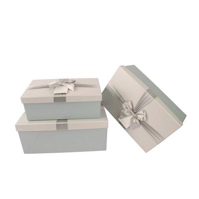 China Recycled Materials Luxury Ribbon Bow Coated Paper Champagne Box Gift Box Wallets/Watches/Jewelry Packaging for sale