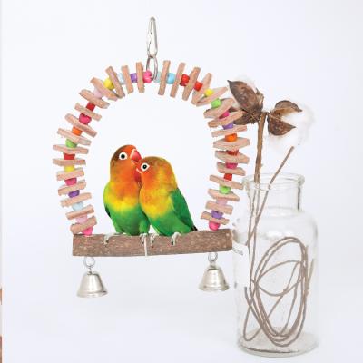 China Viable Wholesale Small and Medium Birds Parrots Dangle Rings Chew Toys Wooden Bird Toy Parts for sale