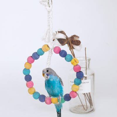 China Viable Wholesale Colorful Wooden Toy Wooden Swing Bird Toys Bird Swing Pet Swing Stand Parrot Cage for sale