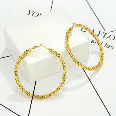 China Fashion Women TRENDY Jewelry Twisted Gold Plated Handmade Stainless Steel Hoop Filled Huggie Earrings For Girls for sale