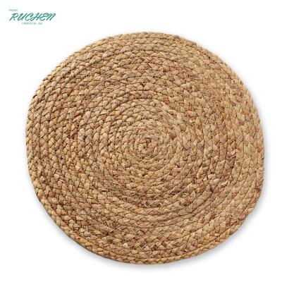 China Hyacinth Woven Round Rattan Table Mat Handmade Pad Kitchen Cup Sustainable Natural Dinner Tool Water Heat Resistant Wedding Place Mats for sale