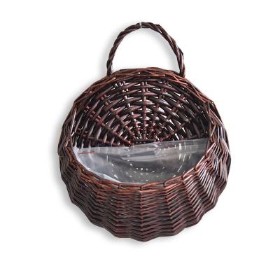 China Rattan Wall Hanging Storage Basket Flower Basket Woven Planter Sustainable Natural Wicker Hanging Pot for sale