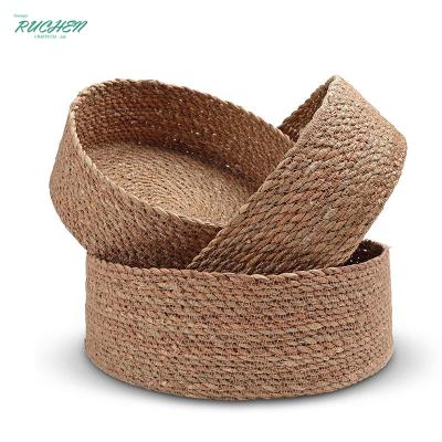 China Sustainable Water Grass Container Woven Cotton Rope Daily Snack Fruits Straw Storage Friendly Home Decoration Round Storage Baskets for sale