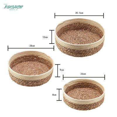 China Sustainable Water Grass Container Woven Cotton Rope Daily Snack Fruits Straw Storage Shallow Home Decoration Round Storage Baskets for sale