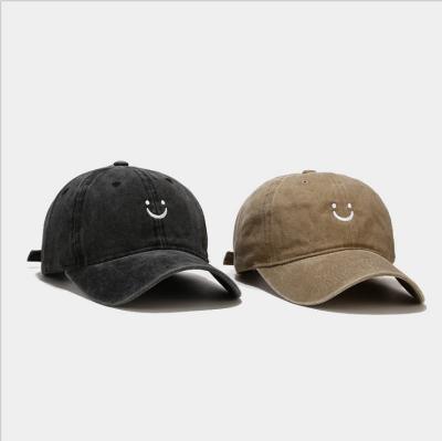 China 2021 COMMON Fashion Smiley Face Washed Baseball Hats for sale