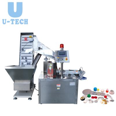 China Small Scale Food Bottle Automatic Plastic Aluminum Foil Inserter Cap Lining Wadding Machinery Price for sale