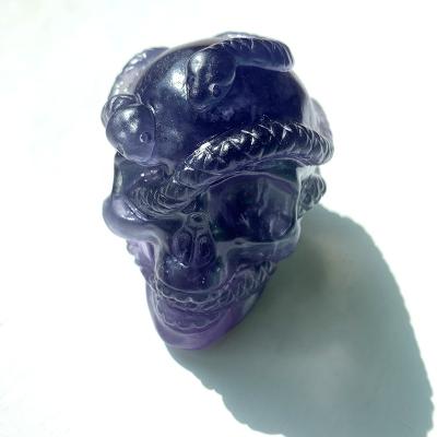 China Wholesale High Quality Natural Green Fluorite Crystals From Europe Skulls With Blue Purple Snake Lizard Fluorite Skulls For Home Decoration for sale