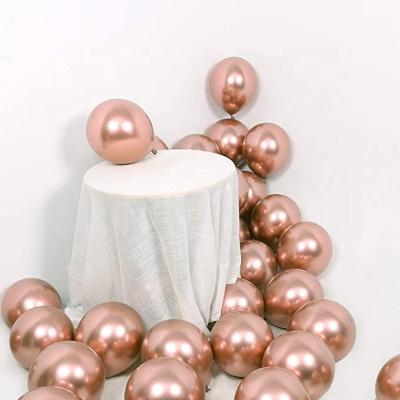 China Indoor Light Luxury Ros Pink Party Decoration 12 Inch Gold 2.8g Pop Metallic Balloon for sale