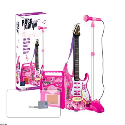 China Battery Operated Plastic Musical Instrumental Electric Guitar Toy With Microphone Speaker Voice For Kids for sale