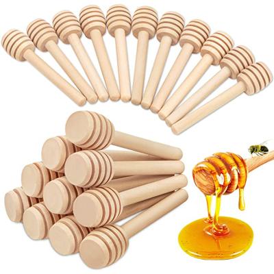 China Eco-Friendly Wood Traditional Newell Organic Custom Bigs Mini Children Size 3 Inch Stick Wooden Spoon Honey Dipper With Custom Logo for sale