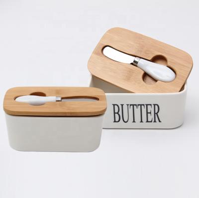 China Viable Wholesale Rectangular Cheap White Ceramic Butter Dish With Knife Food Container for sale