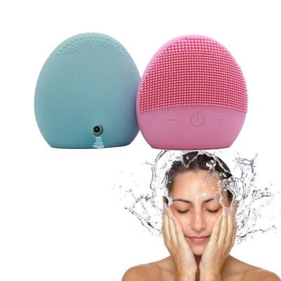 China Silicone DEEP CLEANING Vibrating Makeup Remove Instrument Ultrasonic Facial Facial Massager Beauty Detergent Cleansing Brush for sale