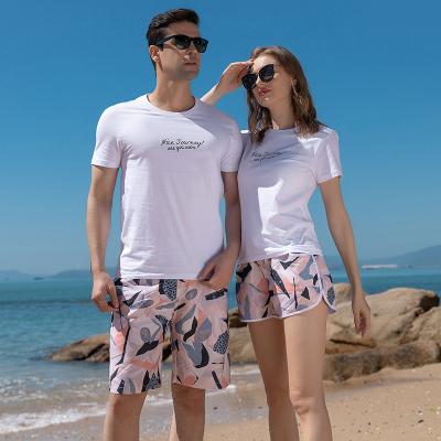 China 2022 QUICK DRY Couple Beach Big Pants Beach Vacation Mens Shorts Surfing Swimming Pants for sale