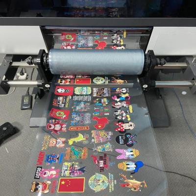 China UVdtf-Printer Roll met Tx800-Printhead en Lamineerder allen in voor de Plastic Printer van de de Drukmachine van het Telefoongeval Te koop