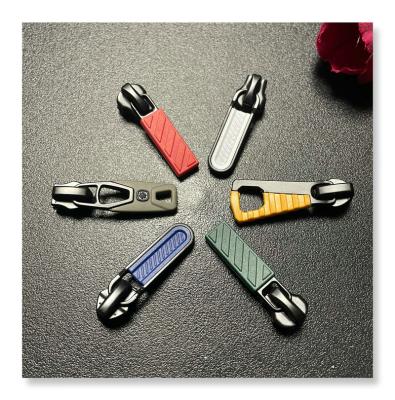 China Fashionable High Quality Customized Alloy PVC PU Zipper Puller Rubber Slider With Logo AY5056 for sale