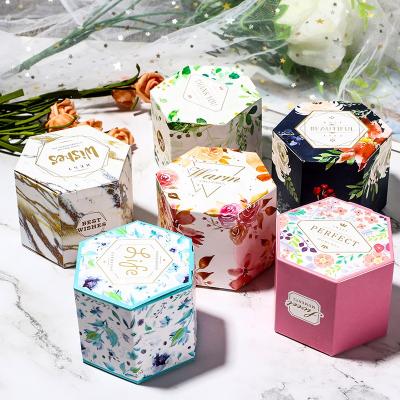 China Reused Materials New Arrival Kids Favor Baby Shower Birthday Party Decoration Donut Theme Hexagon Donut Party Paper Candy Box for sale