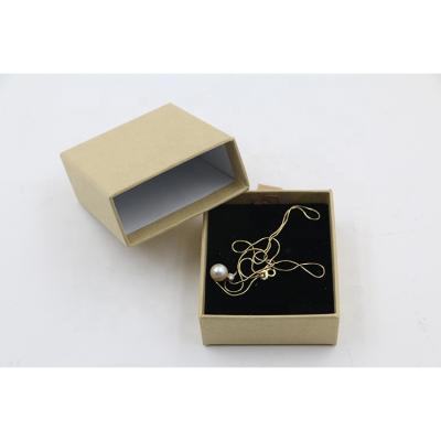 China Jewelry Gift Boxes Slipping Kraft Necklace Ring Paper Jewelry Boxes With Velvet Insert for sale