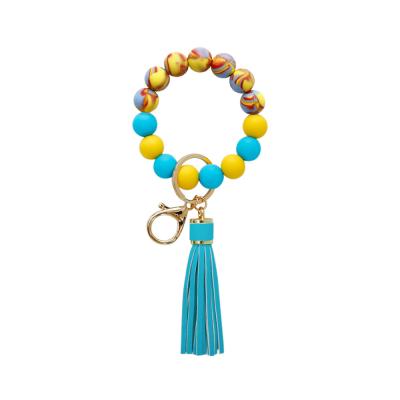 China Modern Key Ring Bracelet Silicone Women Beaded Key Chain Ring Holder Key Ring Holder with Leather Tassel for sale