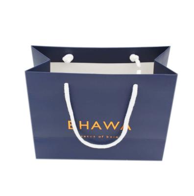 China Gold Foil Recyclable Logo Shopping Paper Bag Printing Recyclable Gift Bag Art Paper 250grm Paper Bag for sale