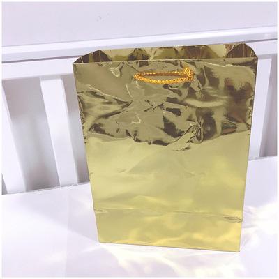 China Recyclable Portable Universal Gift Bag Recyclable Laser Stain Paper Bag Laser Shopping Bag Low Price and Support UV Customization Good Quality for sale