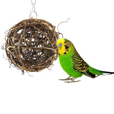 China Viable Cheap Natural Rattan Ball Chewing Biting Gnawing Toy For Bird Parakeet Parrot Hanging Accessories for sale