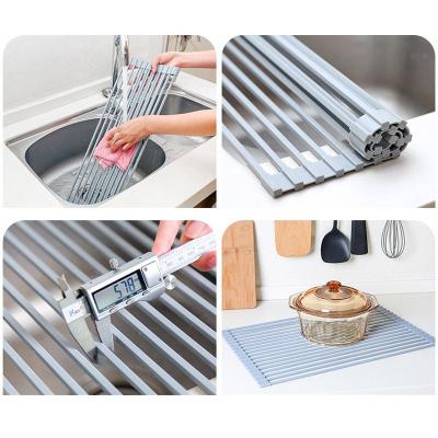 China Sustainable Leatch Kitchen Drain Rack Stainless Steel With Silicone Water Filter for sale