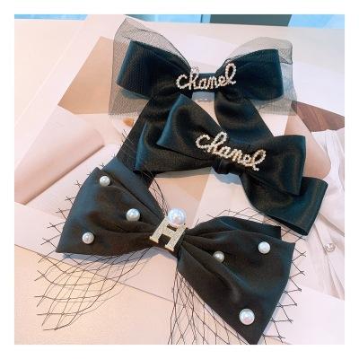 China Black Crystal Letter Hair Clip Tulle Bow Knot Hair Bow Hair Clip 2021 Elegant Women Headband Fashion New for sale