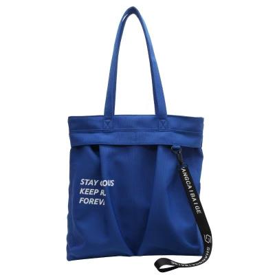 China Portable Wholesale Ladies Invisible Zipper Pouch With Print Hooker Tap Drawstring Weeding Tote Bag New Collection for sale