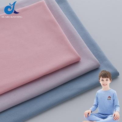 China Single Side Sanding Acrylic Modal Fabric Skin-friendly Brushed Sueded 40S Air Layer Child Double Sided Elastic Fabrics For Thermal Underwear for sale