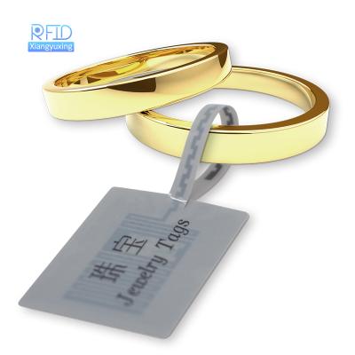 China 13.56MHz 860-960mhz Security NFC Stickers RFID Jewelry Dual Frequency Printable Tamper Proof Waterproof/Waterproof Tamper Tag for sale