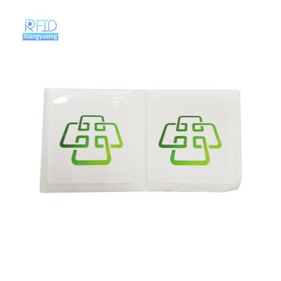 China 860-960MHz UHF RFID Tag Smart Adhesive RFID Wet Tag Inlay Waterproof/Waterproof Customized Library Book Paper Tag for sale