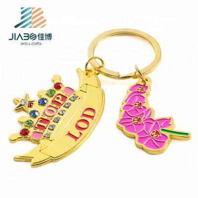 China Custom Shape Metal Crown Rhinestone Key Chain Crown With Letter Key Ring for sale